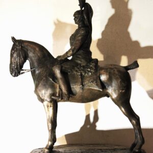 Enrico Malvani (1864-1934) Corazziere, monumento a cavallo fusione bronzea patinata.